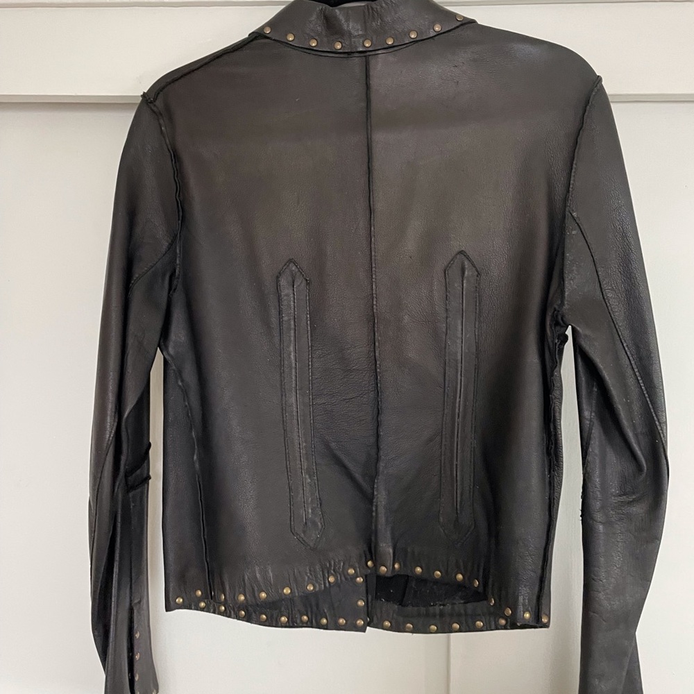Blur leather jacket with grommets